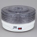 A white Weston 4-tier food dehydrator with a lid.