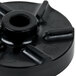 A black plastic Crathco low foam impeller with holes.