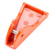 An orange plastic and metal faucet handle kit with a circle clip.