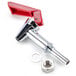 A Bunn faucet assembly with a red and white metal pipe and nut.