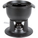 A black Chasseur enameled cast iron fondue pot with a silver base.