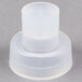 A white plastic cap with a round top.