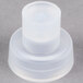 The white plastic cap of a Bunn faucet repair kit.