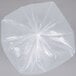 A close-up of a Berry low density clear plastic trash bag with a circular design on the top.