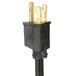 A black electrical plug with gold tips on a white background.