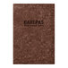 A brown rectangular Menu Solutions cork cover with black text.