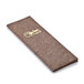A brown rectangular dark cork menu cover with a gold logo on it.