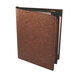 A brown cork Menu Solutions folder with black covers.