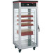 A Hatco Flav-R-Savor pizza holding cabinet with pizza boxes on shelves.