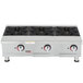 An APW Wyott stainless steel countertop gas hot plate with three burners.