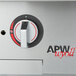 The APW Wyott Workline countertop gas hot plate with three burners, a white object with a dial and the word APW on it.