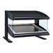 A black rectangular Hatco countertop food warmer with a glass top.