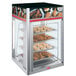 A Hatco Flav-R-Savor holding and display cabinet with food on it.