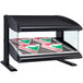A black Hatco countertop heated display case with pizza boxes inside.