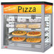 A Hatco countertop hot food display warmer with pizzas in it.
