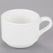 A Tuxton white china cup with a handle.