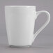 A white Tuxton China mug with a handle.