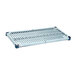 A white MetroMax metal shelf with a plastic grate with holes.