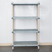 A MetroMax Q shelf in a room with three shelves on a wall.