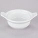 A white bowl with two handles.