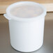 A white Cambro round polypropylene crock with a lid.