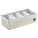 A silver hammered stainless steel condiment bar with four compartments.