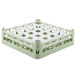 A Vollrath light green plastic glass rack with 25 medium compartments.