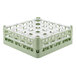 A white and green plastic Vollrath glass rack with 25 compartments.