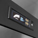 A digital display with the temperature on a Turbo Air M3 Series reach-in refrigerator.