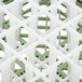 A close up of a white and green Vollrath glass rack.