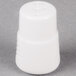 A white porcelain pepper shaker with a black lid.