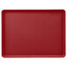A cherry red rectangular tray with a white border.