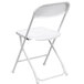 A white Flash Furniture folding chair with a metal frame and backrest.