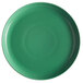 A close-up of a green Tuxton pizza serving plate.
