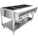 A Vollrath ServeWell electric hot food table with four pans.