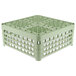 A light green Vollrath glass rack with 30 compartments and holes.