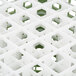 A close up of a white grid with light green accents.