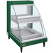 A green Hatco countertop display case with glass doors and two shelves.