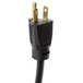 A black power cord with a gold plug on a Hatco GRCDH-3PD Countertop Hot Food Display Warmer.