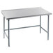 An Advance Tabco stainless steel work table with a backsplash and open base.