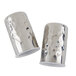 A close-up of a pair of American Metalcraft silver hammered finish salt and pepper shakers.