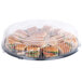 A black Sabert Onyx plastic catering tray with sandwiches inside.