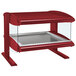 A red Hatco countertop hot food display case with a glass top.