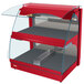 A red Hatco countertop hot food display warmer with two shelves.