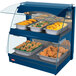 A blue Hatco countertop food warmer with trays of food on display.