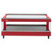 A red and silver rectangular Hatco heated glass display shelf on a table.