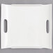 A white rectangular porcelain tray with two handles.