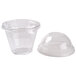 A Squat Fabri-Kal clear plastic container with two clear plastic cups and lids.