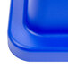 A blue plastic square lid with a round opening.