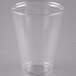 A Solo Ultra Clear clear plastic cup on a grey surface.